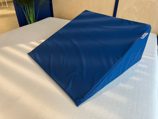 Triangular positioning cushions